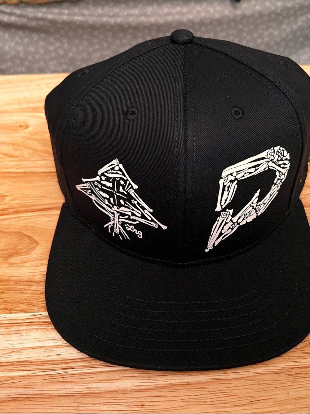 LRG Black Snapback Hat with White Skeleton Graphic one size fits all adjustable